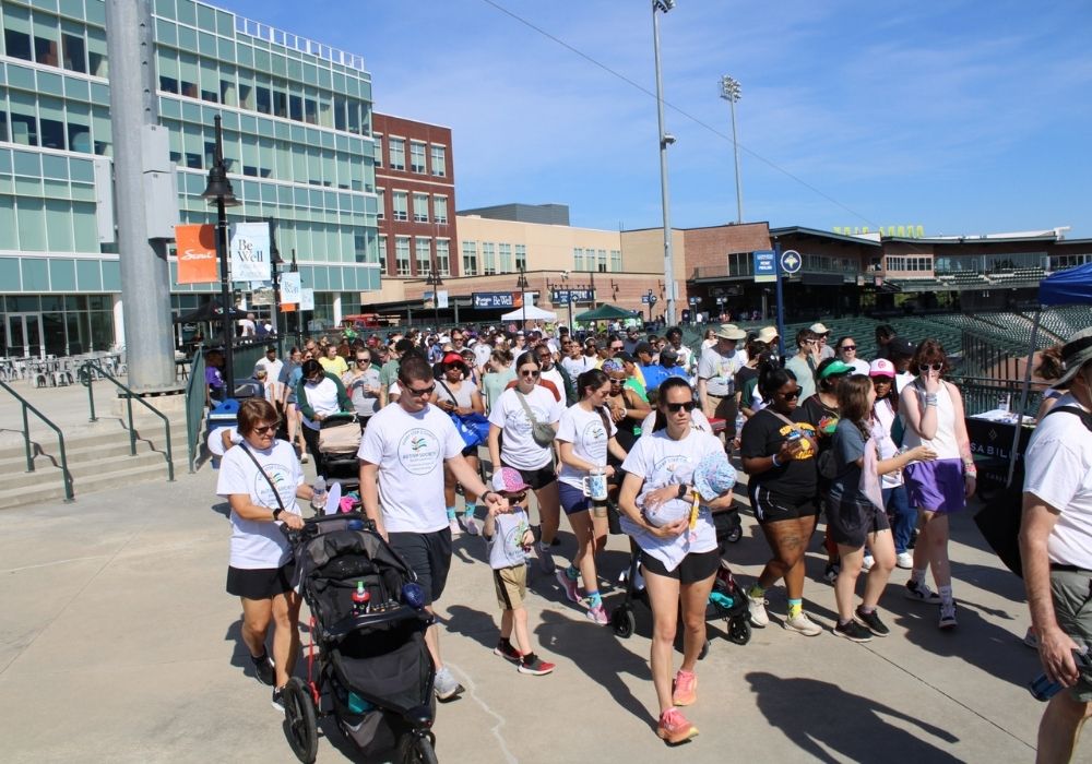 Families walking to route — 2026 Strides for Autism