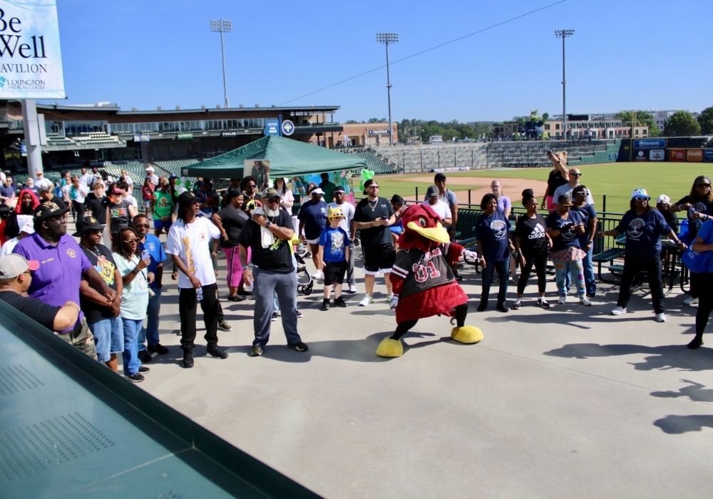 Mascot dancing with crowds — 2026 Strides for Autism
