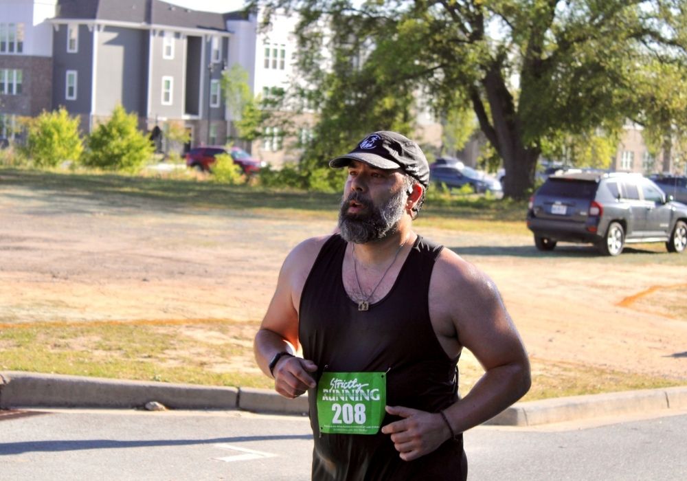 Mid stride solo runner — 2026 Strides for Autism
