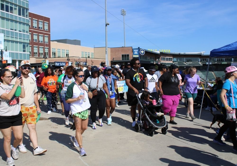 Stroller and kids walking — 2026 Strides for Autism